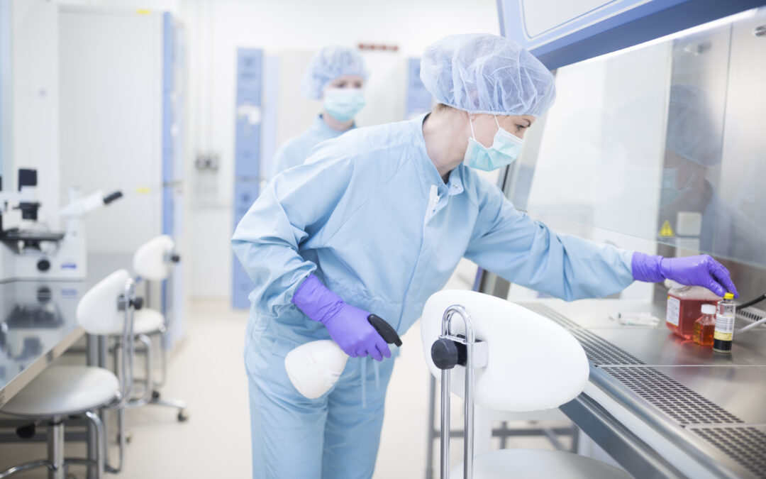 Woman working in life science cleanroom facility